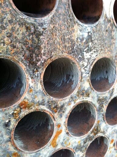 corroded wall of pipes